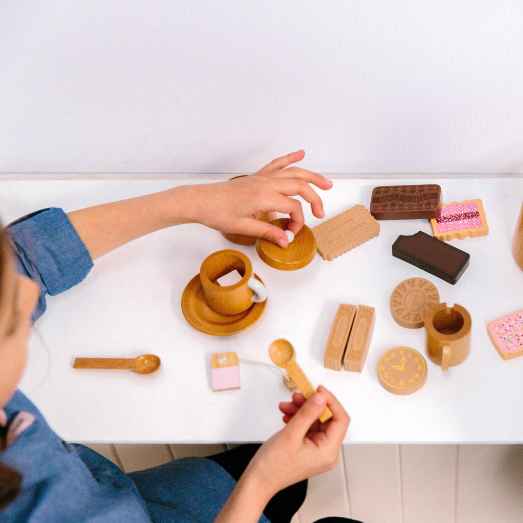 Make Me Iconic Wooden Tea Set top view of set with biscuits