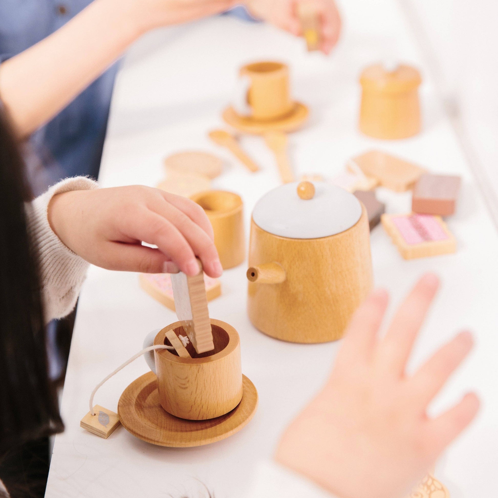 Make Me Iconic Wooden Tea Set children playing image